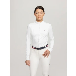 Woman wearing white button up Tommy Hilfiger show shirt,