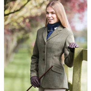 The Equetech Claydon Ladies Tweed Competition Jacket would be a stunning addition to your wardrobe, whether you're heading to the show ring or the hunting field. Made from a timeless heavy-weight cloth, this design also looks just the part paired with jeans and country boots. Features include engraved fox-head buttons, concealed zip pockets for your valuables, and a luxurious jacquard lining for a quality finish. At the back of the Claydon Jacket are double back vents