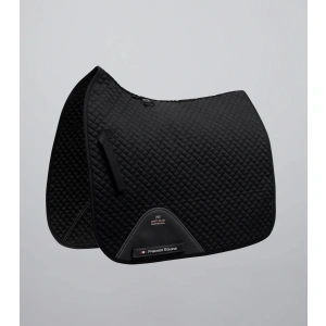 The Premier Equine Close Contact Plain Cotton Dressage Pad (FULL SIZE) is a technically advanced saddle pad engineered for performance and comfort during training or competition. Specifically designed for close contact saddles, this dressage square offers a contoured fit that enhances saddle stability while delivering maximum comfort for your horse. Crafted from the highest quality 100% cotton, this saddle pad is soft yet durable, offering breathability and a luxurious feel. The elegant quilting design enhances both appearance and function, supporting even pressure distribution across the horse’s back. Inside, wicking fibres work efficiently to draw sweat and moisture away from the skin, helping your horse stay dry and comfortable throughout every ride.
