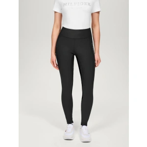 The Tommy Hilfiger Devon Riding Leggings in Black are the ultimate blend of functionality, performance, and sleek equestrian style. Designed for riders who demand both comfort and polish in the saddle, these high-performance leggings are an essential addition to your riding wardrobe. Crafted from a durable and technical stretch fabric composed of 78% polyester and 22% spandex, the Devon leggings move effortlessly with your body. Whether you're schooling at home, hacking out, or heading to a lesson, these leggings offer the flexibility and support needed for every ride. The premium fabric not only allows for optimal freedom of movement but also delivers excellent shape retention, so you stay looking sharp ride after ride.