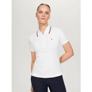 The Tommy Hilfiger Camden Zip Polo Shirt in Optic White brings a refreshing twist to a timeless classic, blending traditional polo elegance with cutting-edge performance. Whether you're training at the yard, attending casual events, or simply embracing a sporty-chic look, this shirt is designed to move with you and keep you comfortable in every setting. Crafted from a thoughtful blend of 67% cotton, 29% polyester, and 4% elastane, the fabric offers a soft, cotton-touch feel while incorporating just the right amount of stretch. This creates a lightweight and breathable shirt that adapts effortlessly to your movements—ideal for both active wear and all-day comfort. The slim-fit silhouette flatters your figure without restricting motion, making it a perfect choice for the dynamic equestrian lifestyle.