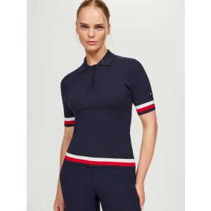 The Tommy Hilfiger Lenox Sweater Polo in Desert Sky redefines equestrian-inspired fashion with a refined yet relaxed approach. This lightweight knit polo effortlessly combines style, comfort, and a flattering fit, making it the perfect choice for those who value both elegance and ease. Whether you're heading to the stables or styling it for everyday wear, this versatile piece quickly becomes a wardrobe favorite. Made from a super-soft blend of 72% rayon and 28% polyester, the Lenox Sweater Polo offers a luxuriously smooth feel against the skin. Its breathable, lightweight knit ensures comfort while remaining cozy enough for layering across seasons. The ribbed construction, enhanced with a super stretch design, allows the fabric to mold gently to your body’s shape. This guarantees not only a perfect fit but also a sleek, polished silhouette that flatters every figure