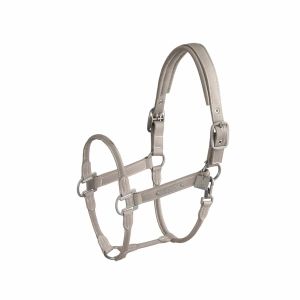 The Eskadron Leather DoublePin Headcollar in velvet taupe (COB SIZE) is a premium choice for equestrians who seek both elegance and functionality in their horse’s tack. Crafted from high-quality real leather, this headcollar offers a luxurious yet durable design. The partly round shape enhances its refined appearance. While the super soft and supple finish ensures superior comfort for your horse. Whether used daily or for competitions, this headcollar is designed to provide both style and practicality. For enhanced strength, the headcollar is reinforced with tear-proof webbing on the inside, ensuring long-lasting durability. This makes it a reliable choice for leading, transporting, or handling your horse with confidence. Despite its sturdy construction, the headcollar remains soft and flexible, preventing discomfort or irritation.
