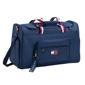 Tommy Hilfiger Hampton Weekender Bag - Desert Sky Travel in style and convenience with the Tommy Hilfiger Hampton Weekender Bag, designed for both casual getaways and the demands of an equestrian lifestyle. Crafted with premium materials and featuring the iconic Tommy Hilfiger aesthetic, this bag blends fashion with functionality, making it a must-have accessory for those who are always on the go.