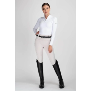 Mochara Full Seat Pull On Breeches – Stone. Take your riding wardrobe to the next level with the Mochara Full Seat Pull On Breeches in Stone. Designed to combine smart style with everyday comfort, these breeches are perfect for both competitions and daily training sessions. With their flattering fit and high-performance fabric, they offer everything you need for confident, comfortable riding. Crafted from premium non see-through fabric, they’re treated with a unique finish to reflect UV rays and reduce heat absorption, offering SPF 40+ sun protection. Whether you’re riding outdoors or spending hours in the saddle, you’ll stay cool, protected, and focused.